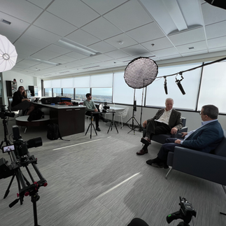 lights and cameras filming a corporate podcast