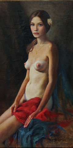 Nude girl with flower in hair
