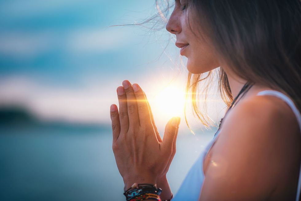 A woman practicing mindfulness and deep breathing.