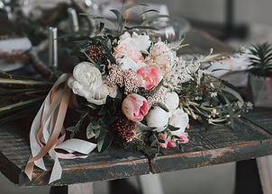 rustic bouquet on green wooden table 448