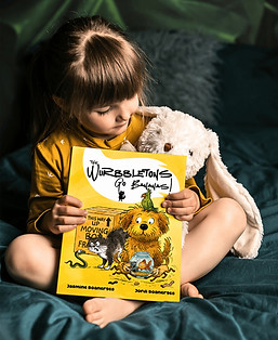 child holding a book