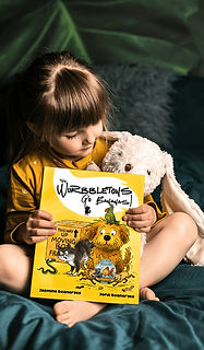 child holding a book