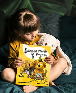 child holding a book