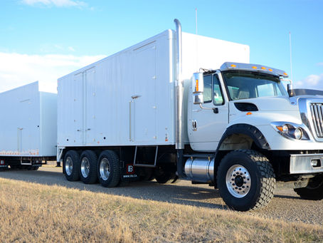 Utility truck with a trailer attached