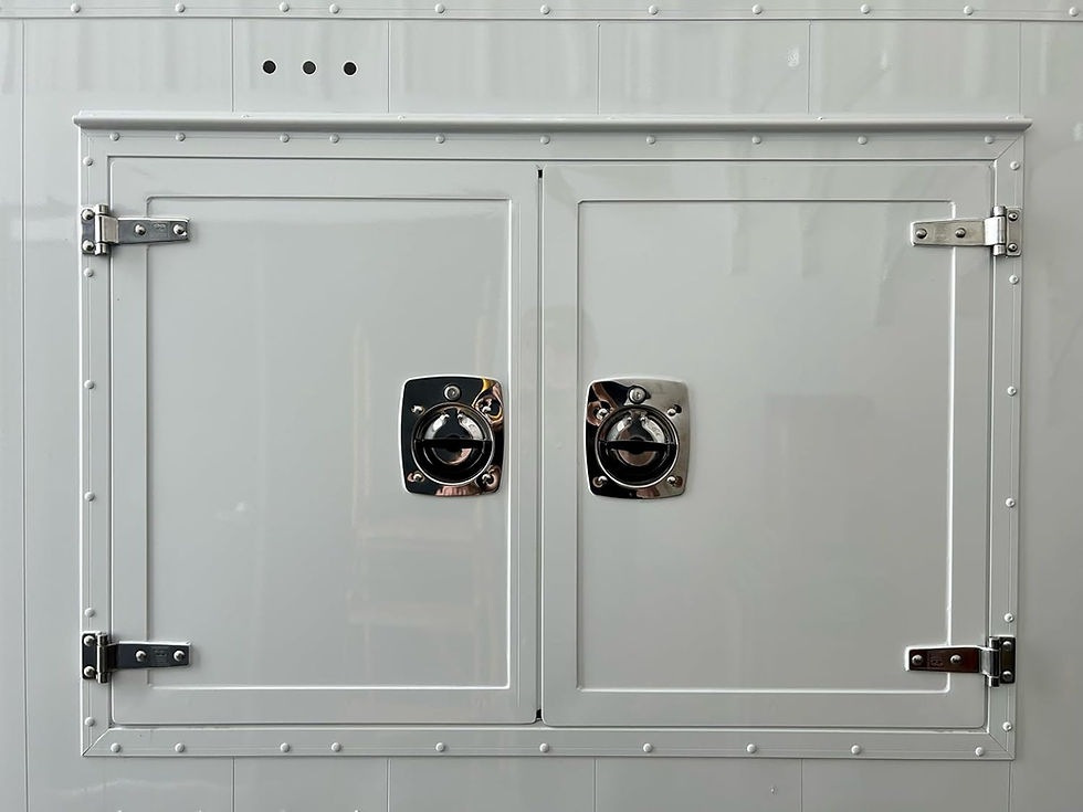 White double doors with locking latches on trailer