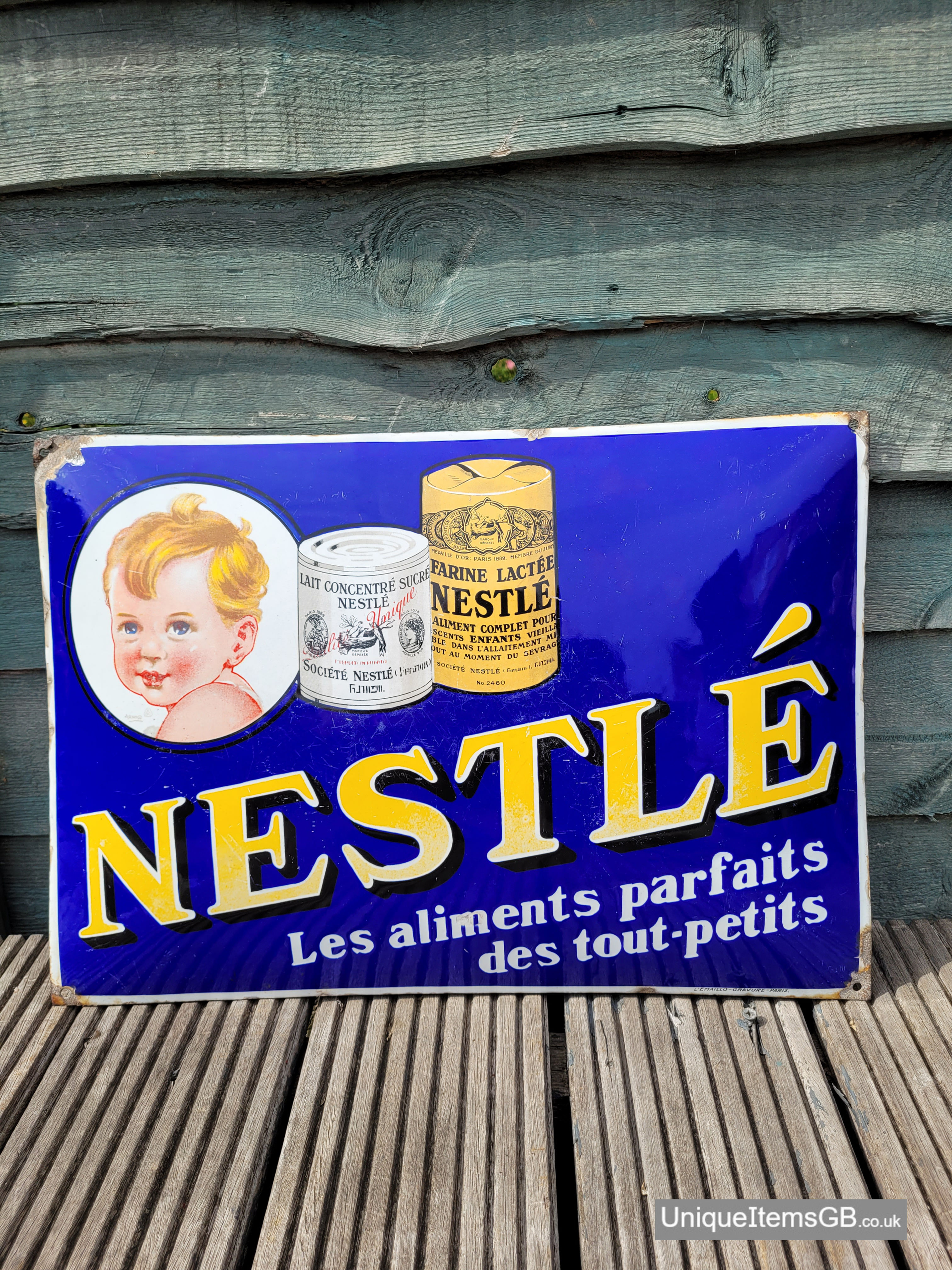 Genuine 1910's PICTORIAL NESTLE Enamel Sign Advertising 19" x 13.5"