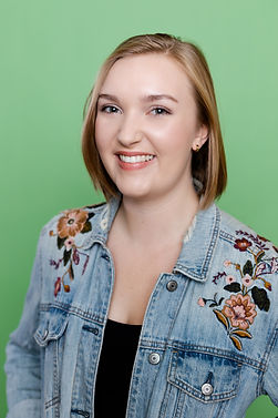 Olivia Ricketts Headshot 6 smile denim jacket