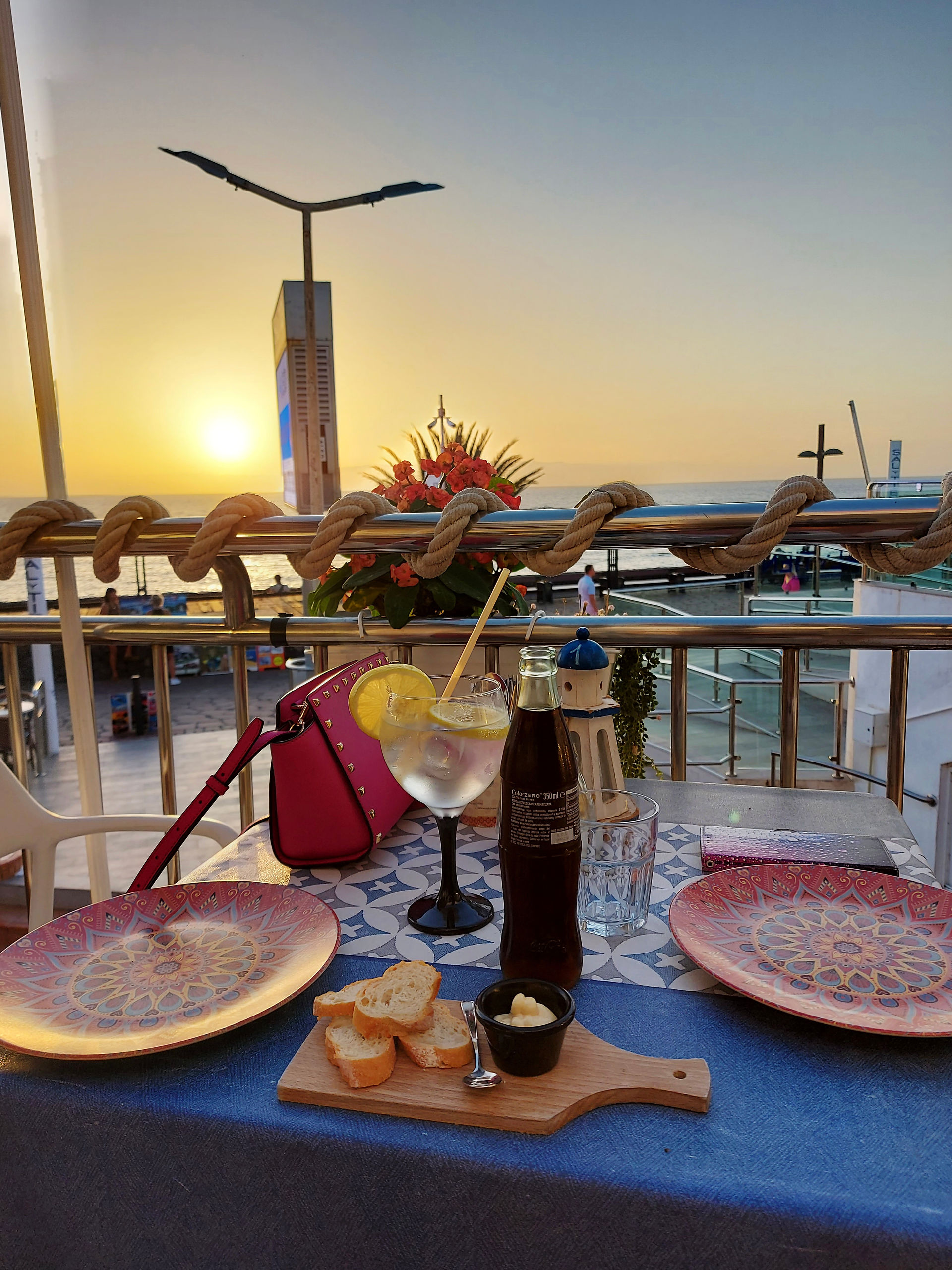 Table with drinks at sunset 