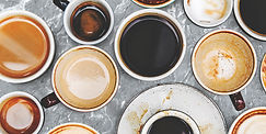 assorted-coffee-cups-marble-background.jpeg