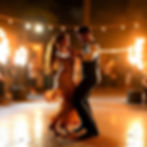 Couple dancing passionately at the night of their wedding.