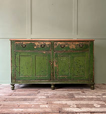 A large Victorian Painted Pine Kitchen Base