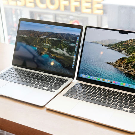 Two open laptops on a desk