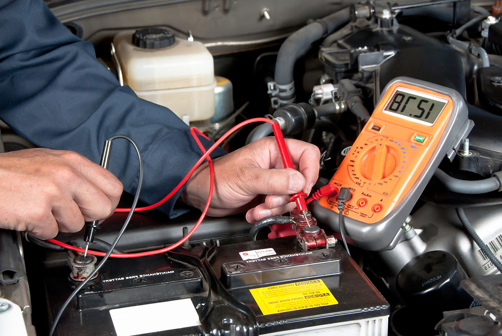 A mechanic checking the car
