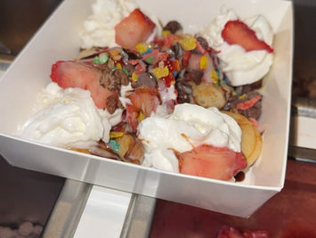 Chocolate covered strawberries and dessert snacks served on Austin snack cart