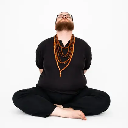 sitting hands folded behind back head in neck