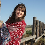 Jolene author photo fence.JPG