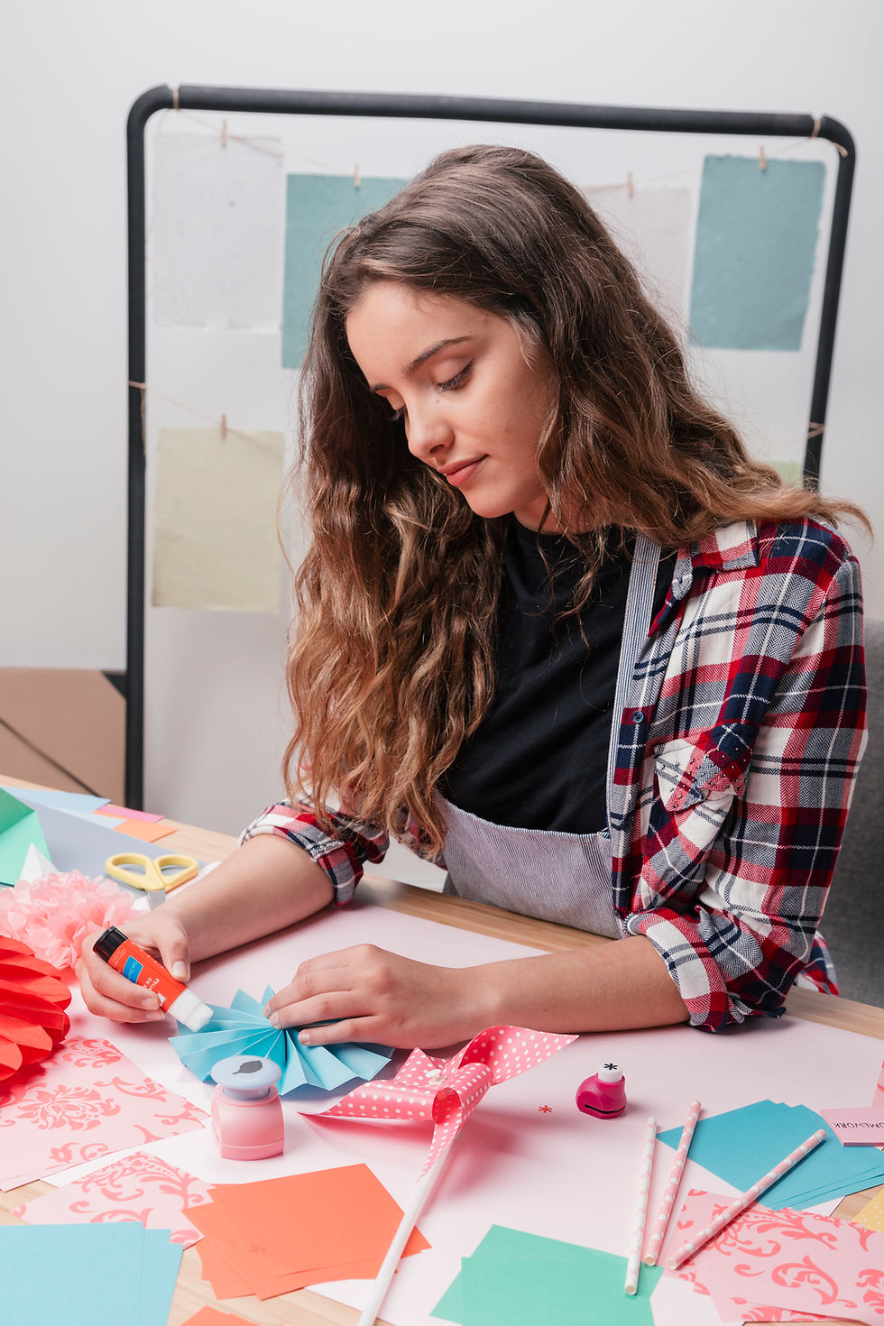 portrait-attractive-woman-making-creative-origami-crafts.jpg