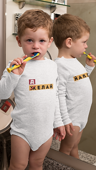 mockup-of-a-baby-boy-wearing-a-onesie-while-brushing-his-teeth-29916.png