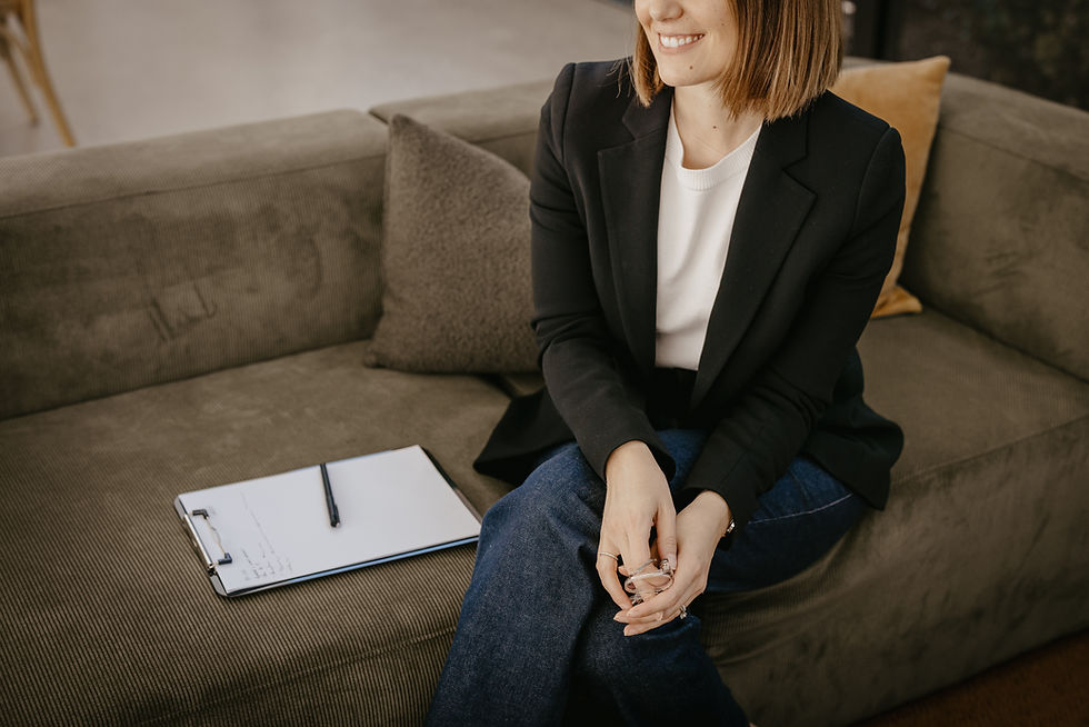 A top down image of Dianne Casotti sitting on a couch