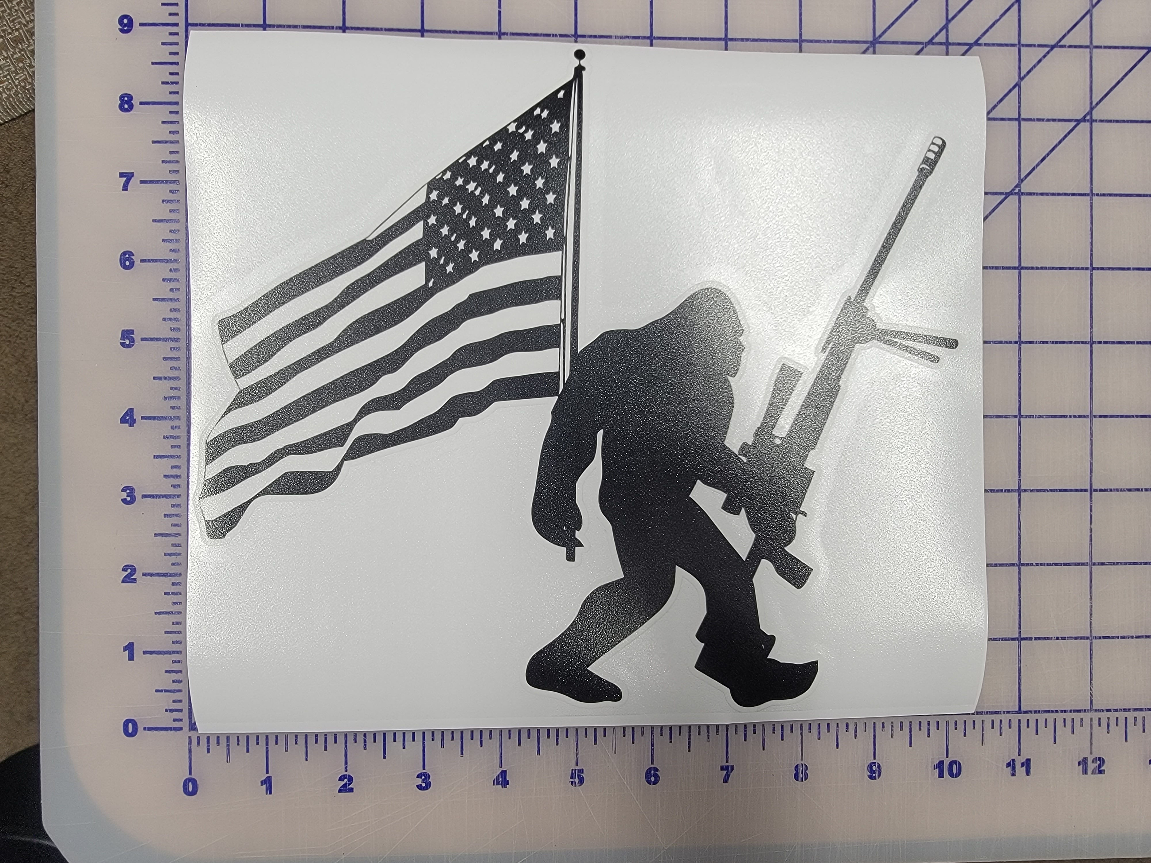 Bigfoot with American Flag and 50 Cal  10" decal Flip Off | Fits all trucks