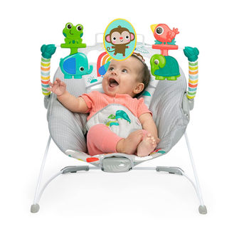 bebê relaxando em cadeira vibratória confortável