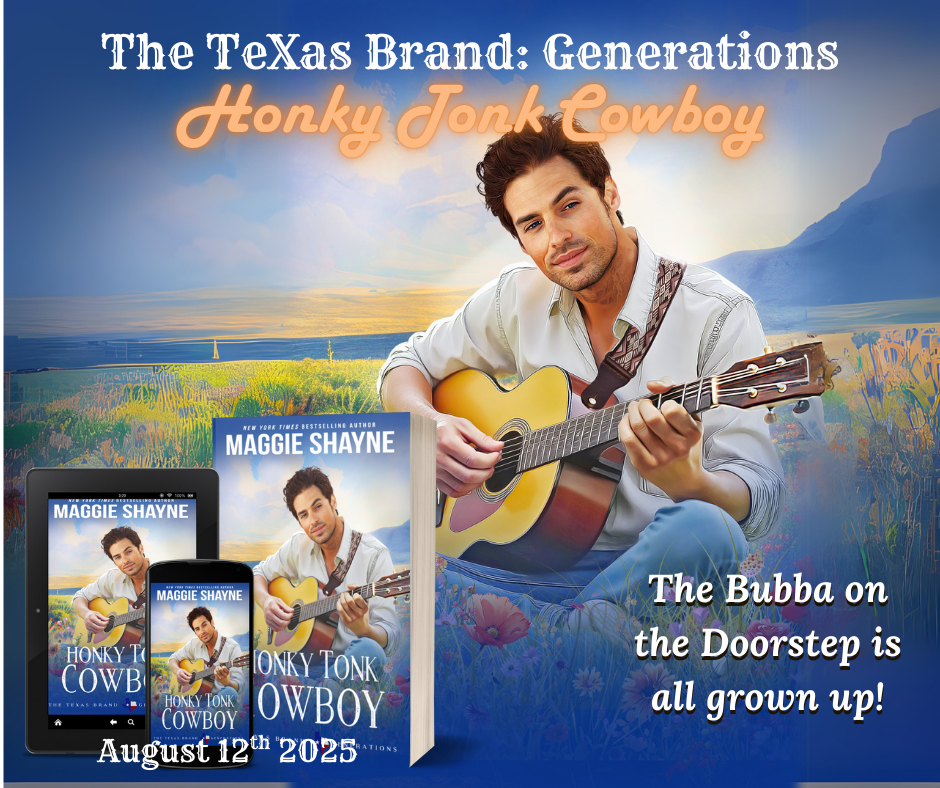A handsome man strumming a guitar while sitting in a field of wildflowers.