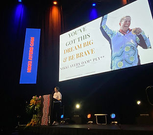 Nikki Ayers on stage.jpg