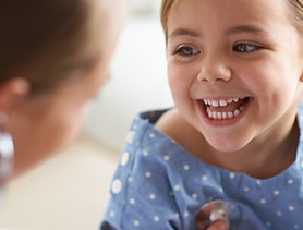 Smiling child with doctor