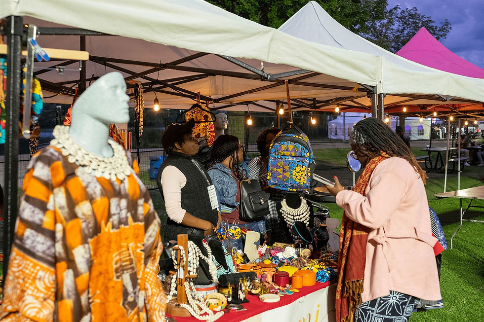 Afrofestival Ottawa merchandise vendor selling to customer
