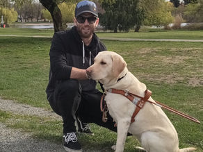 VISUALLY IMPAIRED FORMER SOLDIER GRATEFUL FOR GUIDE DOGS