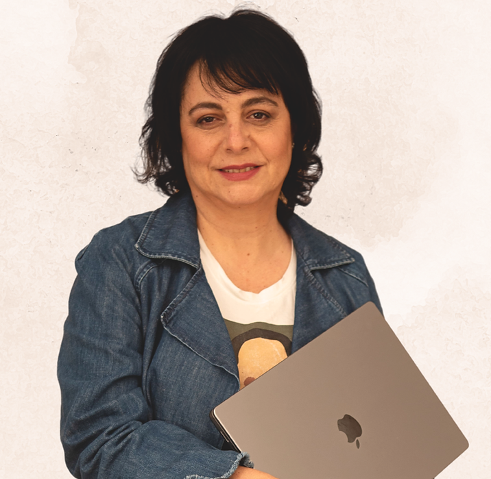 Efrat Dagan, founder of Workaround, with a laptop