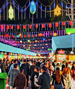 The vibrant Harbin Normal University Night Market at night. Colorful lanterns and neon lights illuminate rows of food stalls serving the best Northeast Chinese street food