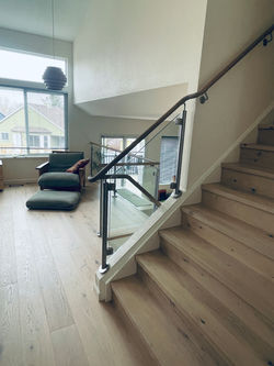 white oak rail, glass panels, stainless steel posts