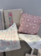 Hand printed cushions and tea towels