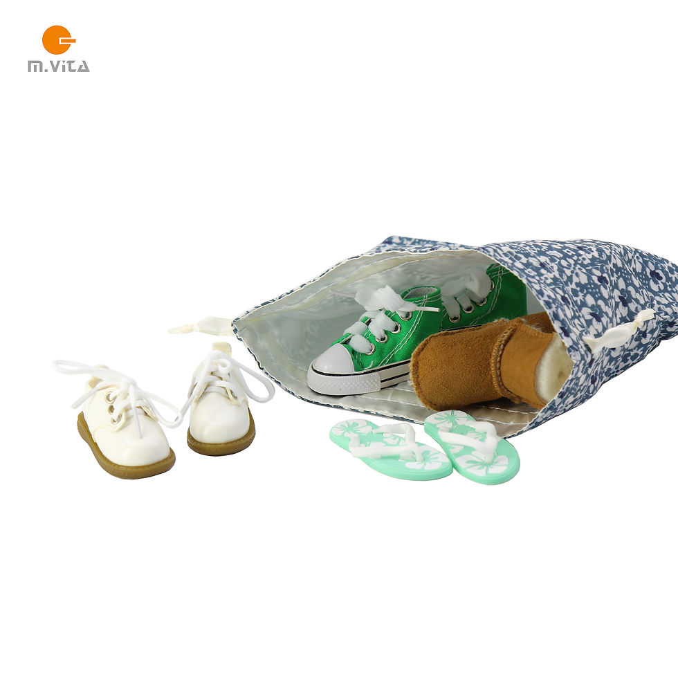 Thumbnail: Miniature white leather lace-up shoes used for tactile discrimination in Montessori stereognostic bag activity