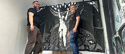 Andrew Benincasa installing his paste-up with the able assistance of Shannon Benson .jpeg
