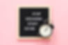 Stop Dreaming Start Doing. Motivational quote on frame letter board and black alarm clock