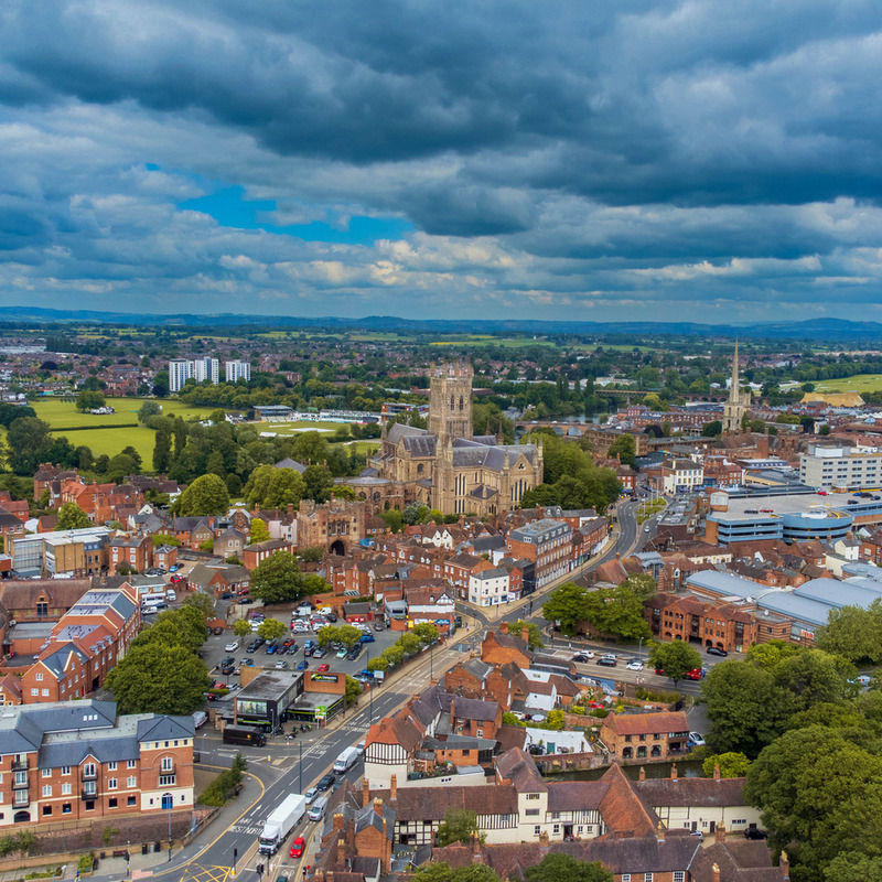 Worcester city featuring red brick houses and Worcester cathedral.