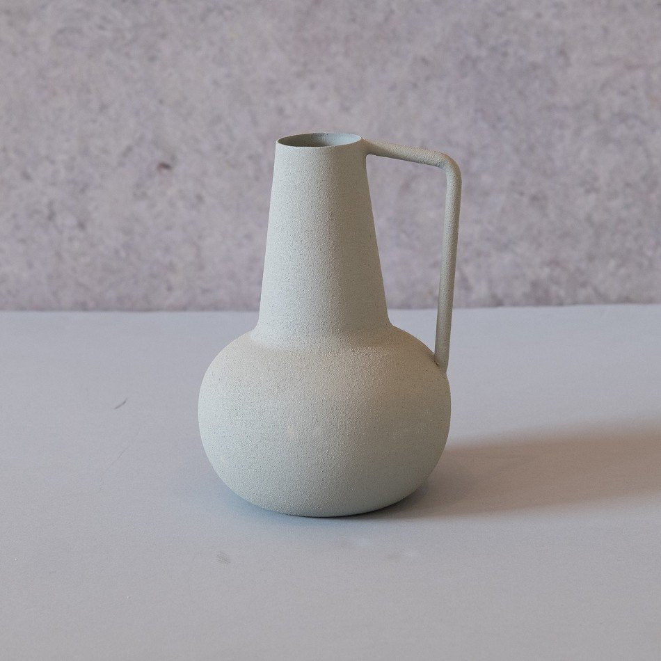 Thumbnail: תמונה של אגרטל מתכת קטן בצבע ירוק מנטה