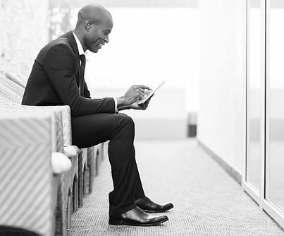 Confident businessman waiting for an int