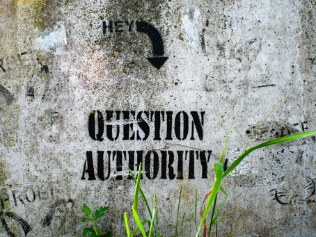 question authority written on a wall