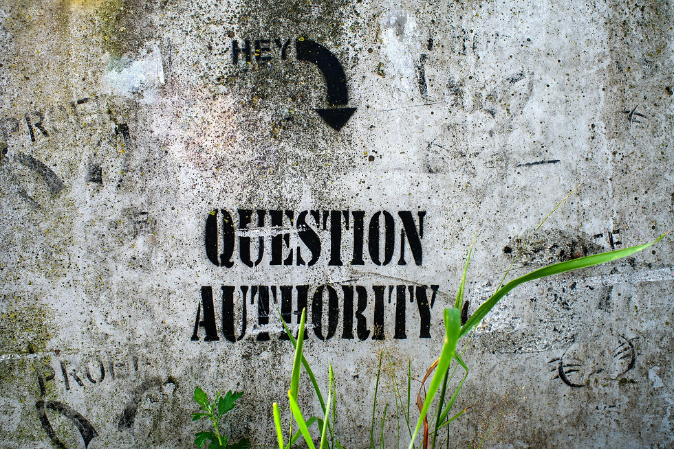 question authority written on a wall