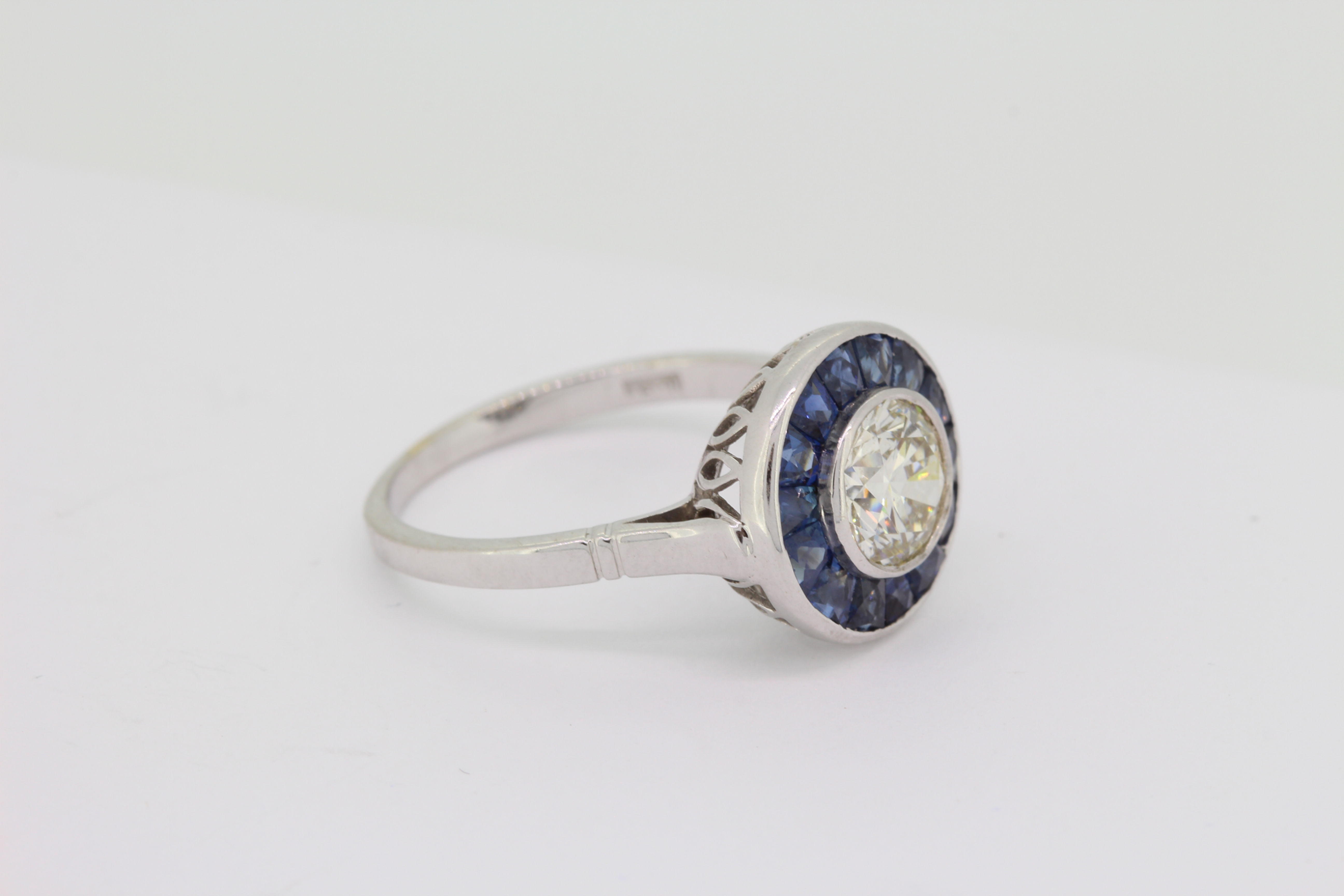 Sapphire and diamond target ring centre D1.21cts