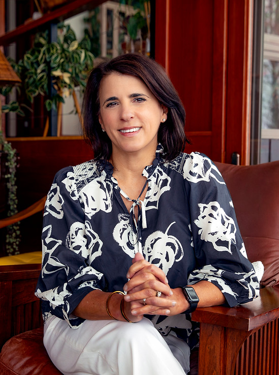 Jennifer Higgins, a professional growth coach, facilitator, and speaker with 30 years of leadership experience.