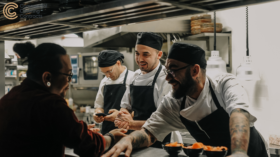 Kitchen staff in a commercial kitchen