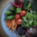 Freshly harvested vegetables: tomatoes, peppers, cucumbers, carrots
