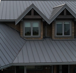 metal roof on house with dormers