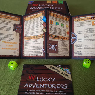 A folded out rulebook from Unlucky Adventurers
