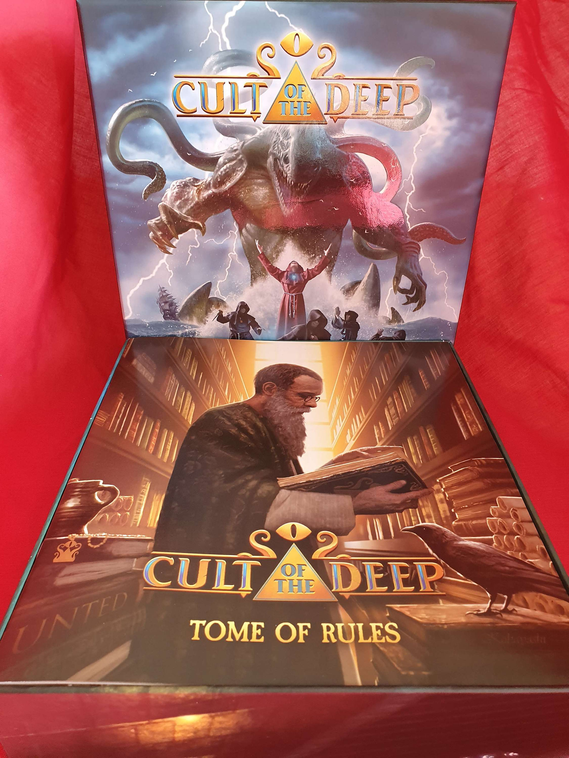 The box of the Cult of the Deep game, with lower box ready to have the lid put on