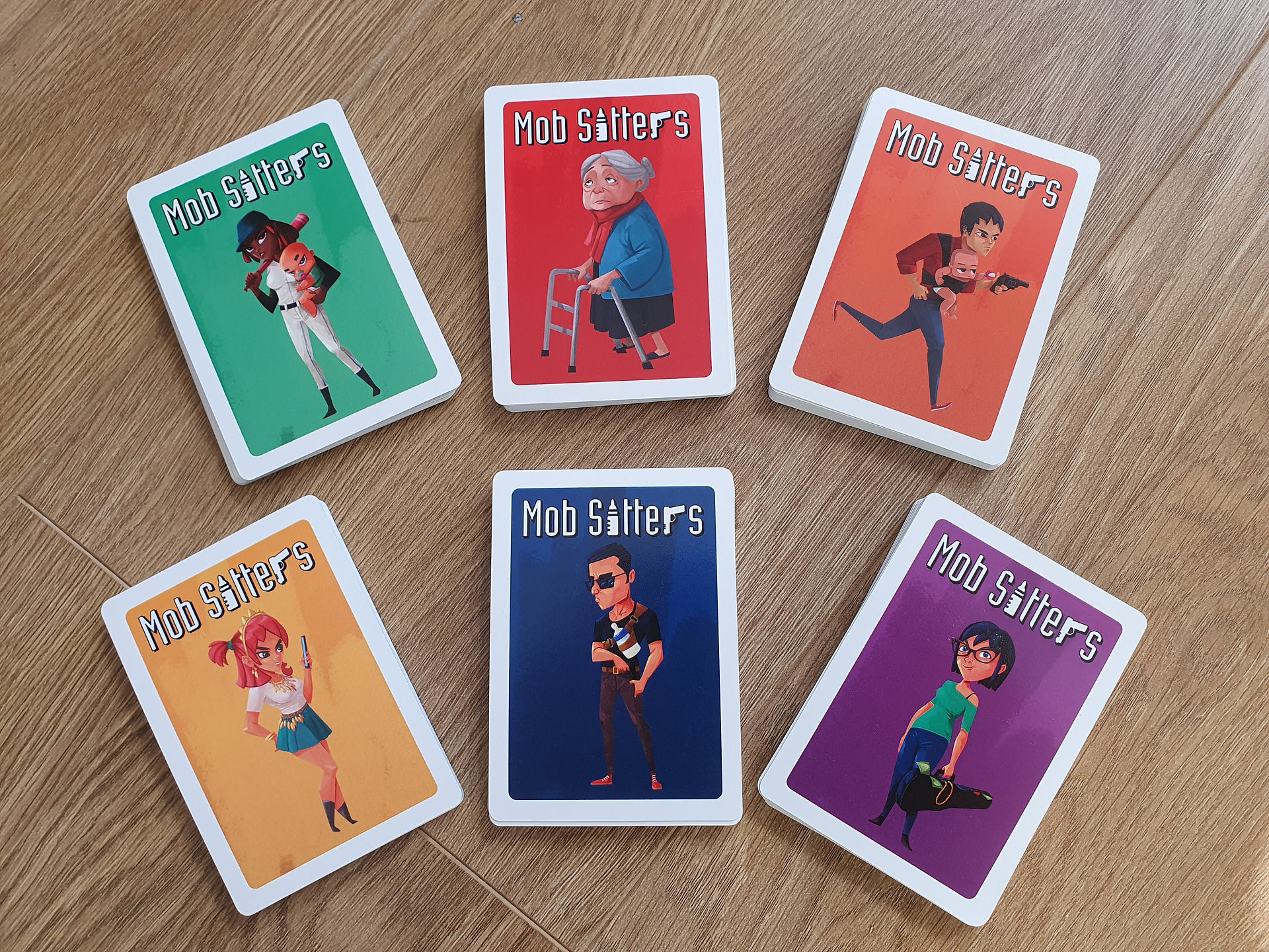 Backs of cards from the Mob Sitters game